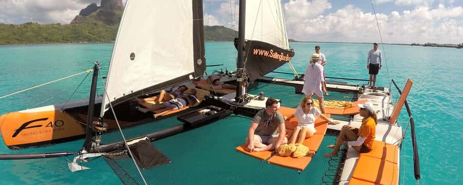 Bora Bora: Half Day Catamaran Sailing & Snorkelling - Meeting Vitamin Sea: speedboat pickup and a former racing catamaran